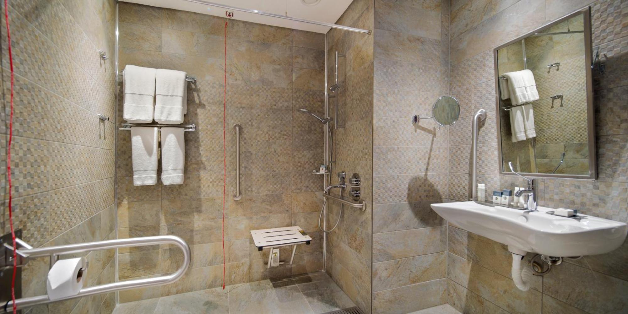 Doubletree By Hilton Istanbul - Piyalepasa Istambul Exterior foto A shower seat